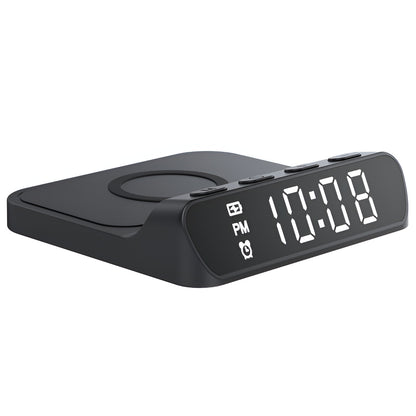 Black digital clock with wireless charging pad on a white background