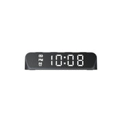 Digital clock with LED display on a white background