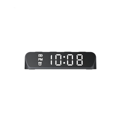 Digital clock with LED display on a white background