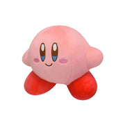 A plush toy resembling the character Kirby from Nintendo's video games, with vibrant pink skin, red shoes, and a smiling face.
