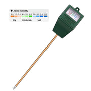 Green humidity meter with wooden probe on a white background