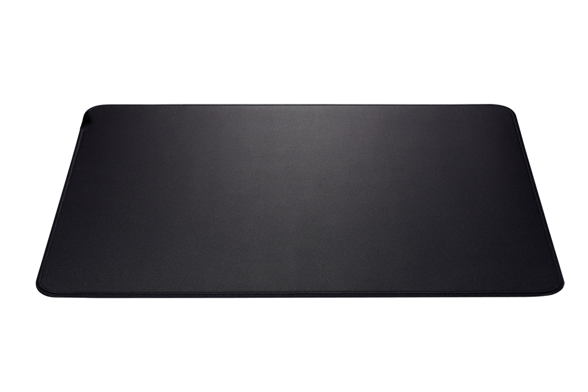 Black desk mat on a white background