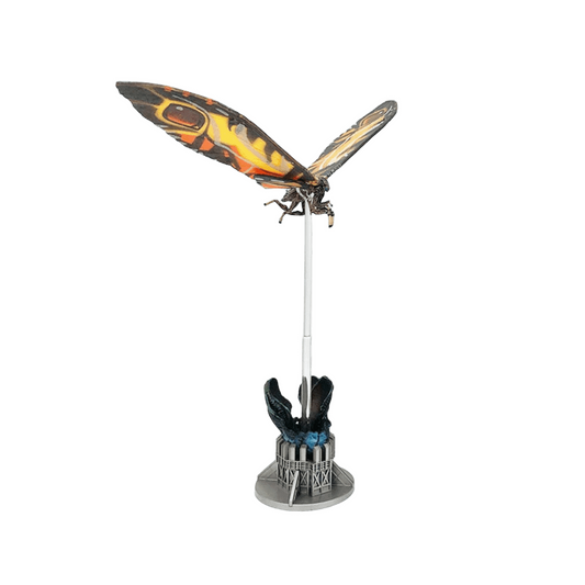 Decorative item with a butterfly and a hand holding a dagger on a white background