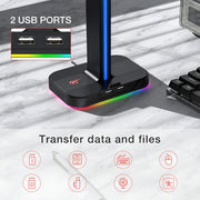 USB hub with RGB lighting on a marble surface, showing two USB ports.