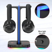 Black headphones on a stand with blue light feature and RGB base