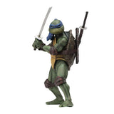 A Teenage Mutant Ninja Turtles action figure with a green and gray body, holding a sword and a staff, wearing a bandana and a belt.