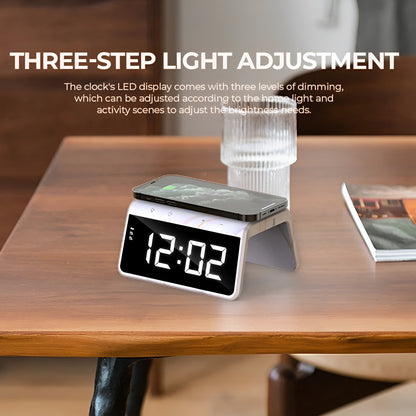 Digital clock with wireless charging pad on a wooden table, featuring three-step light adjustment text.
