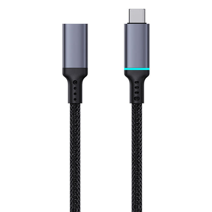 A black Baseus High Definition Series 10Gbps Extension Cable with USB-C connectors and a braided design.