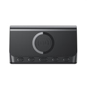 Black wireless charging pad with control buttons on a white background