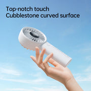 Jisulife Life4 Handheld Fan 3600mAh 5 Speed LED Display Handheld fan held by a hand with text about top-notch touch and cubblestone curved surface on a blue sky background