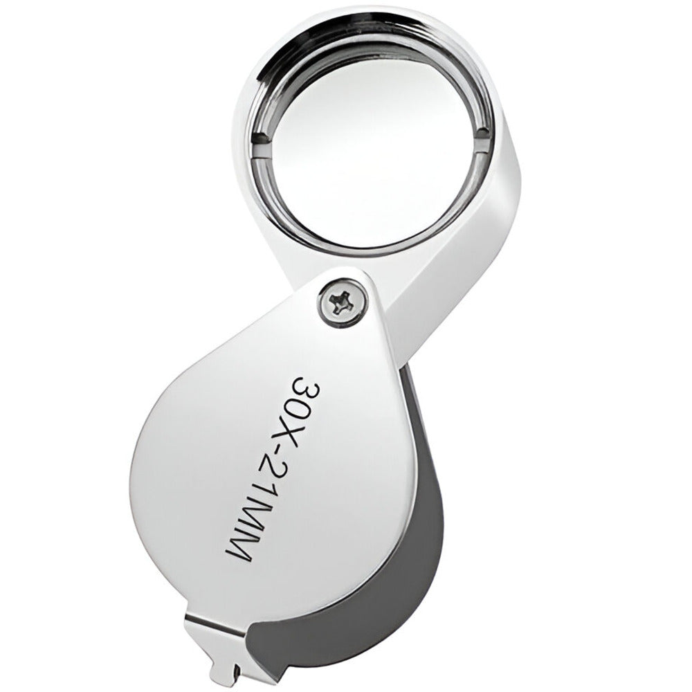 Silver magnifying glass with 30x magnification on a white background / Magnifying Jewelers Eye Loupe - 30x Magnification