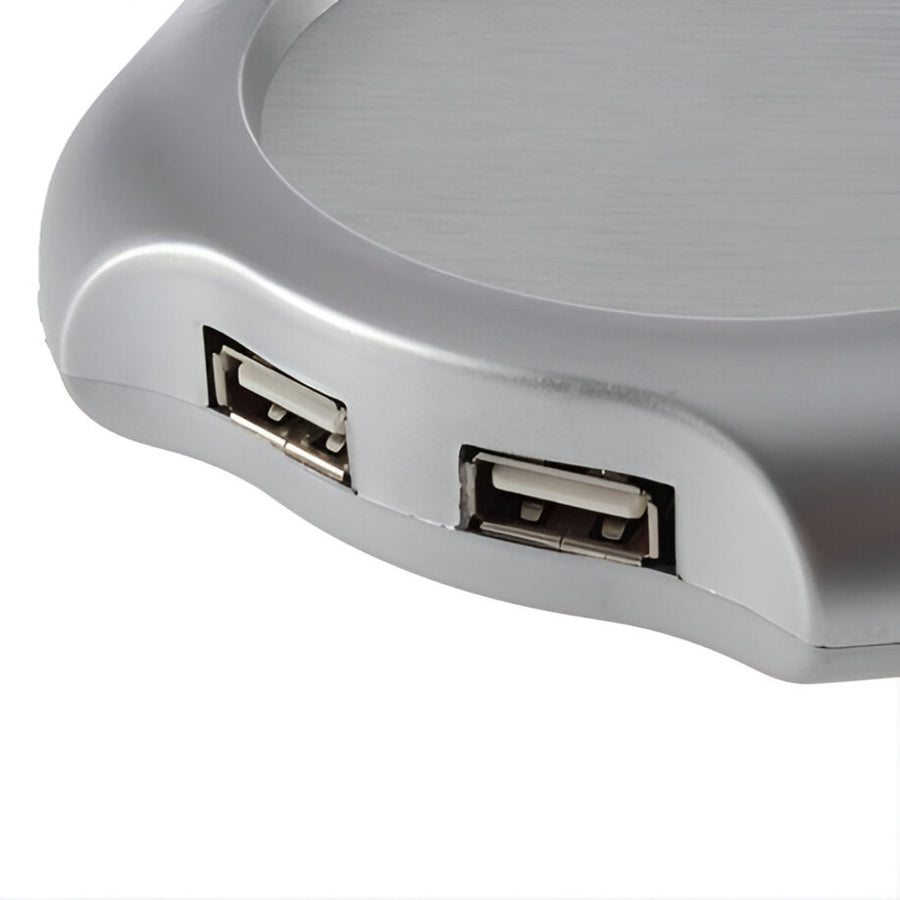 USB Mug Warmer And 4 Port Hub, Close-up of a gray USB hub with multiple ports on a white background