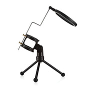 Black adjustable lamp with clamp on a white background