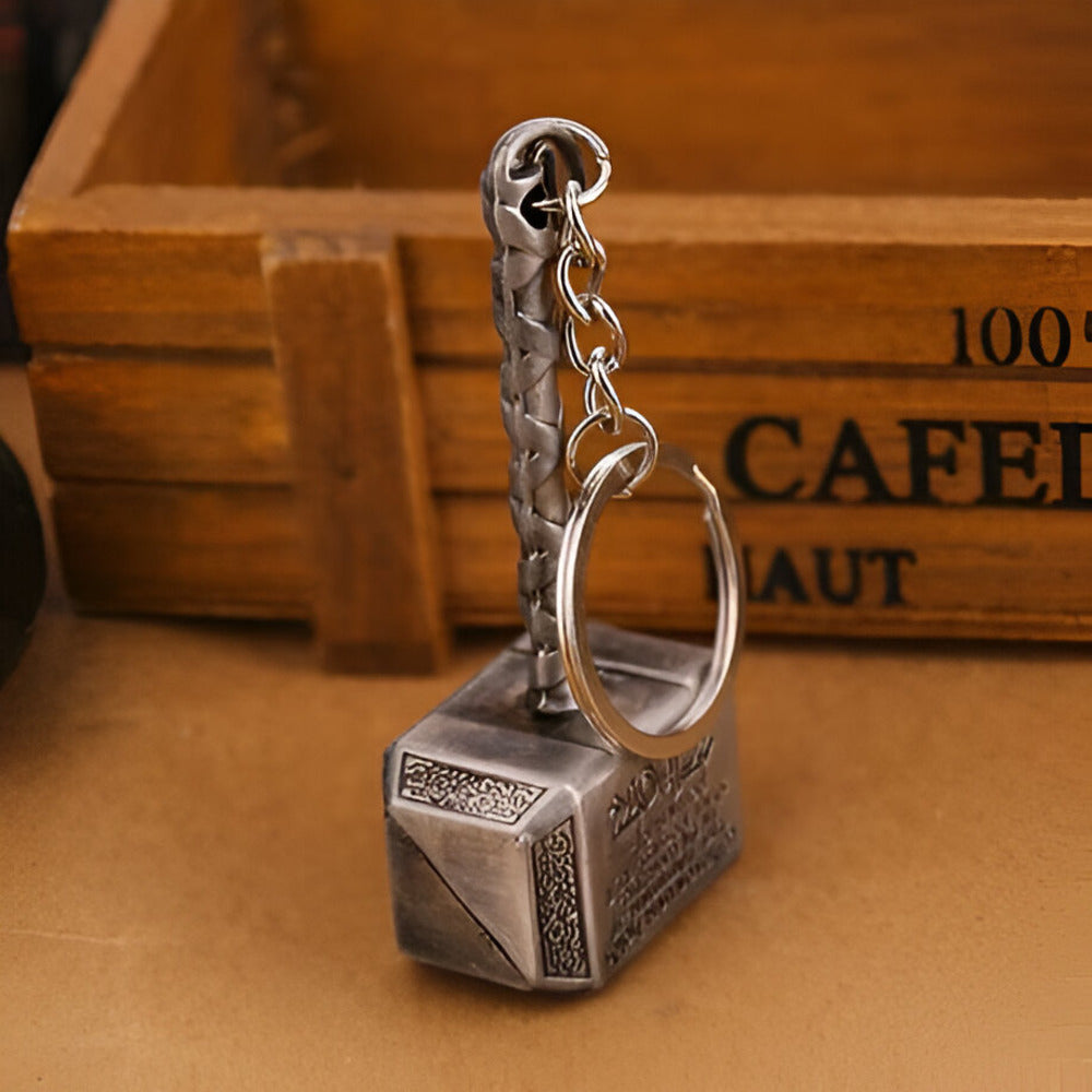Silver keychain with a锤头 design on a wooden surface / Marvel Avenger's Thor's Hammer Mjolnir Keychain