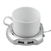 USB Mug Warmer And 4 Port Hub, White mug on a silver heating pad with USB ports on a white background