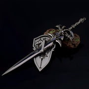 Decorative sword with a shield on a dark background
