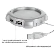 USB Mug Warmer And 4 Port Hub, Metal hot plate with USB ports and insulation material, USB cable attached.